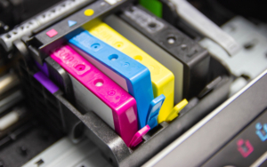 Close up view of CMYK printer ink carts