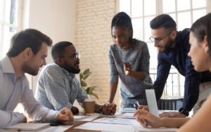 Small group of workers having a meeting in office