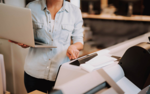 View of person using a large format printer