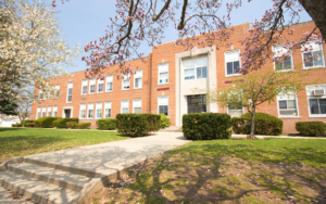 Frontal view of a school building during the day