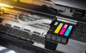 Close up view of printer ink cartridges inside printer