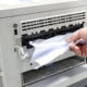 A printer with jammed paper.