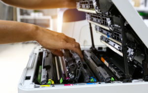 Technician hand open cover printer photocopier